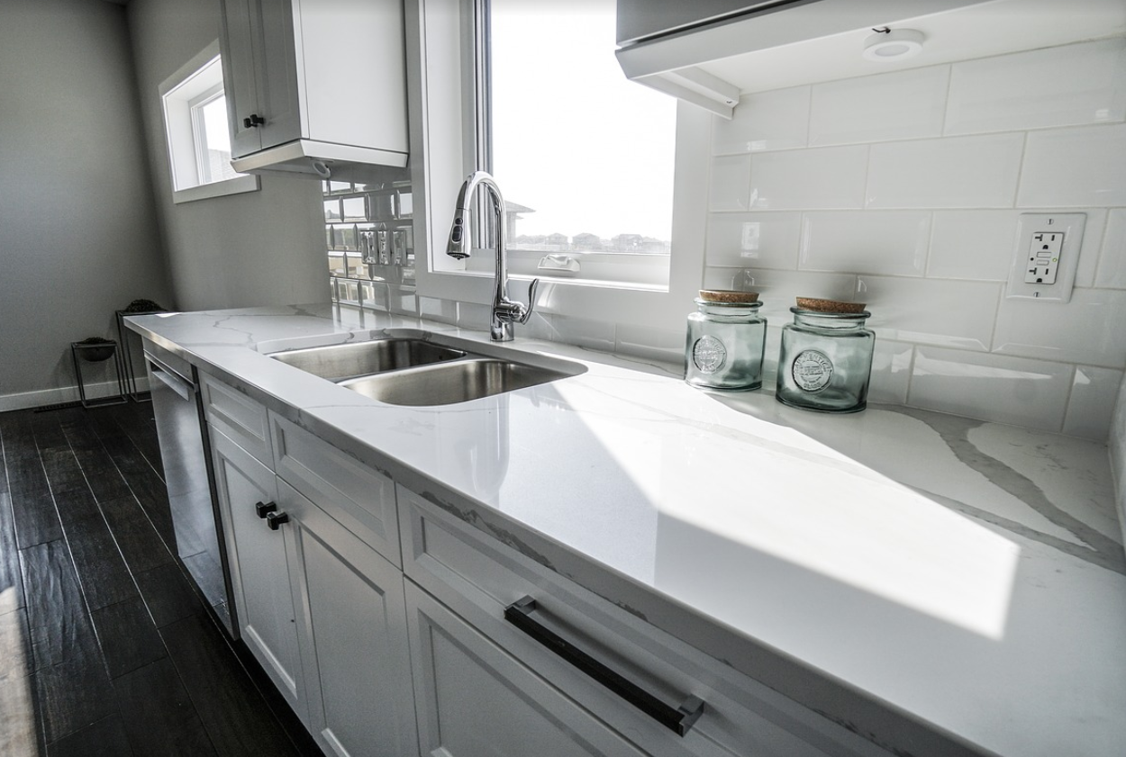 White kitchen with white countertop