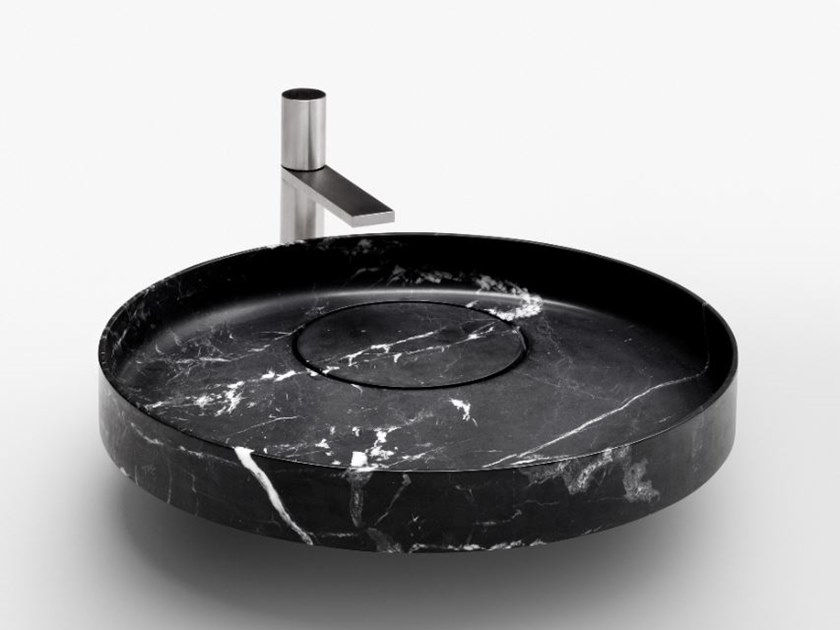 Eccentrico marble washbasin