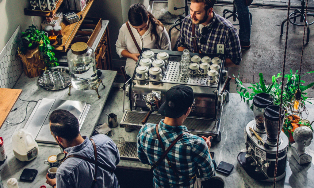 Baristas at countertop