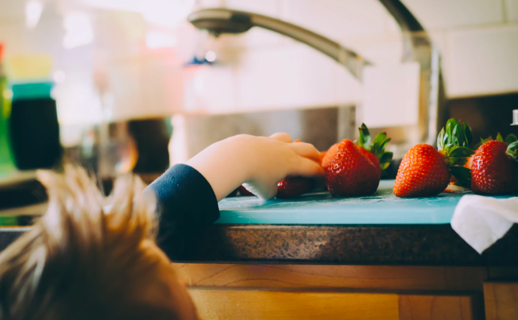 Picking fruits over the counter